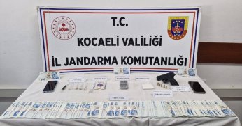 Sahte Para, Uyuşturucu ve Silah Ele Geçirildi 